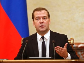 Russia's Prime Minister Dmitry Medvedev leads a government meeting in Moscow, Aug. 7, 2014. REUTERS/Dmitry Astakhov/RIA Novosti/Pool