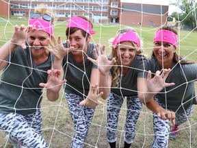 JOHN LAPPA/THE SUDBURY STAR/QMI AGENCYFilthy Felines team members Melanie Junge, left, Laura Gregorini, Renee Desjardins, and Andrea Favot will be participating in the Sudbury Branch of the Canadian Cancer Society's first annual Dirty Divas Mud Run at the Adanac Ski Hill on Saturday, August 16, 2014. The event, which is a fundraiser for cancer research, features women of all ages and fitness levels running, walking or skipping through a 5-kilometre obstacle course.
