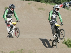 The Stony Plain BMX club will be staging two days of competitive racing at their newly upgraded track this weekend, when the rest of the province comes calling for part of the Provincial Series racing weekend. It is expected that around 400 riders will compete and along with them, another 1,000 people or so will converge on Stony for the weekend’s activities. The local club expects to have upwards of 30 or more riders from their ranks compete, likely including these two who were photographed earlier this year at one of the practice nights the club stages each week. - Gord Montgomery, Reporter/Examiner