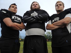Abed Hamidi, John Allarie and Brad Herbst (left to right) will be three of the key defensive players as Myers Riders look to win the OVFL varsity championship against Essex Saturday at Carleton University. (Tim Baines/Ottawa Sun)