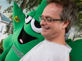 Pot activist Marc Emery poses for photos on Tuesday as he speaks to media and supporters at City Hall Plaza in Windsor following his release from a U.S. federal prison, where he served 4? years for selling marijuana seeds online. (CRAIG GLOVER/The London Free Press)