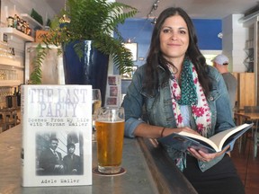 Steph Black sits beside a book and a beer at The Front Door in downtown Sarnia. Lambton County libraries are launching a new program that combines books and beverages later this month. BRENT BOLES / THE OBSERVER / QMI AGENCY