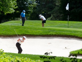 A group of golfers play on the eighth green at the London Hunt and Country Club in London, Ontario on Wednesday August 13, 2014.  The club will host the CP Women's Open beginning August 18. CRAIG GLOVER/The London Free Press/QMI Agency