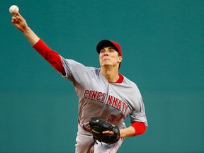 Homer Bailey of the Cincinatti Reds pitches against the Boston Red Sox in the first inning during the interleague game at Fenway Park on May 6, 2014. (Jared Wickerham/Getty Images/AFP)
