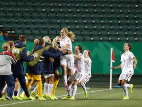 Lindsey Horan (centre) celebrates a goal at the FIFA U-20 Women's World Cup. (Ian Kucerak, QMI Agency)