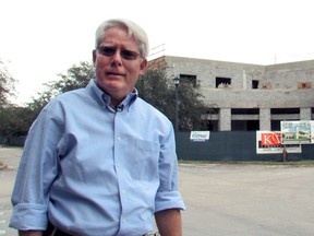 Miami Lakes Mayor Wayne Slaton standing in front of the Miami Lakes Town Hall before its completion. Both Slaton and his predecessor, Michael Pizzi, are claiming the community's top spot after a federal jury this week cleared Pizzi of corruption charges.
(Photo by Chris Graveline, Wikimedia Commons)