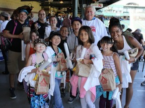 Earl Barish, chairman of B’nai Brith Canada’s national executive (rear) with a group attending the 2012 B'nai Brith Afternoon With The Goldeyes at Shaw Park.