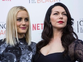 Cast members Laura Prepon and Taylor Schilling attend the season two premiere of "Orange is the New Black" in New York May 15, 2014. REUTERS/Eric Thayer