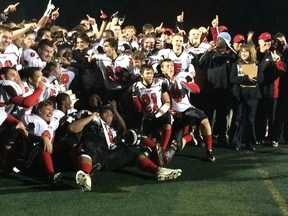 Myers Riders varsity squad celebrate after winning OVFL division title. SUBMITTED