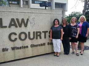 From left to right, Edmonton's Law Information Centre (LInC) staff members Ellie DeCosta, Jennifer Kovacs, Shelly Fode and Teresa Holwell stand outside the Edmonton Law Courts building. Tony Blais/Edmonton Sun/QMI Agency