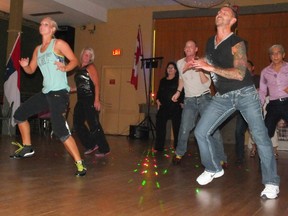 Zumba instructor Brian Slaughter, right, dances up a storm at a Charity Latin Fiesta in Sarnia, Ont. (BRENT BOLES/The Observer/Postmedia Network file photo)
