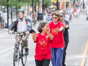 Taoist Tai Chi volunteers make the most of Open Streets T.O. on Aug. 17. (ERNEST DOROSZUK, Toronto Sun)
