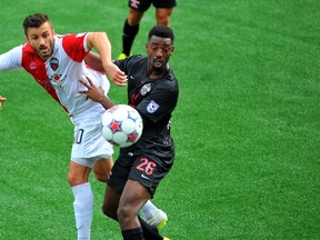 Ottawa Fury midfielder Sinisa Ubiparipovic battles for the ball against a San Antonino player on Sunday in Ottawa. DEAN JONCAS/OTTAWA SUN