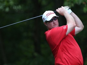Brad Fritsch of Canada plays his tee shot on the second hole during the final round of the Wyndham Championship at Sedgefield Country Club on August 17, 2014 in Greensboro, North Carolina.  Todd Warshaw/Getty Images/AFP​