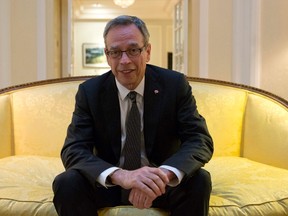 Canada's Finance Minister Joe Oliver poses for a portrait in the Canadian High Commissioner's official residence in London June 23, 2014. REUTERS/Neil Hall