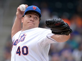 New York Mets starting pitcher Bartolo Colon (40) pitches in the first inning against the San Francisco Giants at Citi Field on Aug 3, 2014 in New York, NY, USA. (Robert Deutsch/USA TODAY Sports)