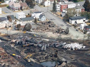 The remains of a burnt train are seen in Lac Megantic, Quebec in this July 8, 2013 file photo.  REUTERS/Mathieu Belanger