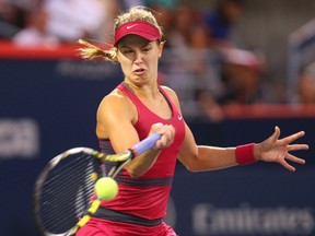 Eugenie Bouchard of Canada plays against Shelby Rogers of Unites States on day two of the Rogers Cup tennis tournament at Uniprix Stadium on Aug 5, 2014 in Montreal, Quebec, Canada. (Jean-Yves Ahern/USA TODAY Sports)