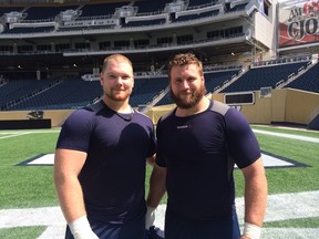Zach Anderson (right) welcomed his brother Chad into the Bombers fold on Monday.