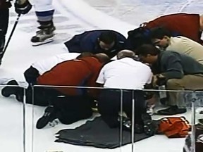 The aftermath following Todd Bertuzzi's suck-punch on Steve Moore in 2004.