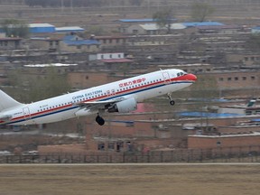 A China Eastern Airlines plane takes off at an airport in Taiyuan, Shanxi province, April 5, 2013. (REUTERS/Jon Woo)