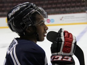 Windsor Spitfires forward Josh Ho-Sang looks on during a practice during the Spitfires training camp at the WFCU Centre in Windsor, Ont. August 29, 2012. (MARC GIRARD/WINDSOR THIS WEEK/QMI AGENCY)