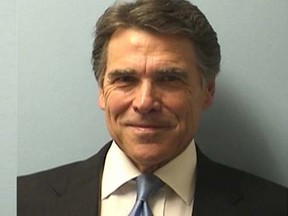 Texas Governor Rick Perry is pictured in this booking photo courtesy of Travis County Sheriff’s Office, released on August 19, 2014.   REUTERS/Travis County Sheriff’s Office/Handout