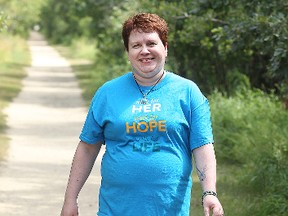 Ovarian cancer survivor Louise Drinnan is seen in Winnipeg, Man. Tuesday Aug. 19, 2014. Drinnan will be participating in a cancer walk in September.