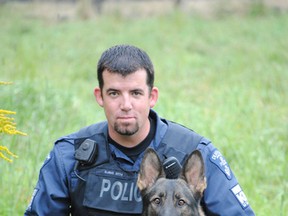 Durham Regional Police Det.-Const. Jeff Burns and Reese, a five-year-old German shepherd that died last week. (Supplied photo)