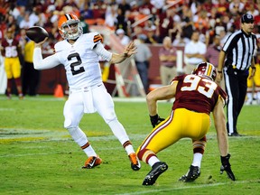 Browns quarterback Johnny Manziel throws a pass as Redskins linebacker Trent Murphy pressures him on Monday night. (USA Today/photo)