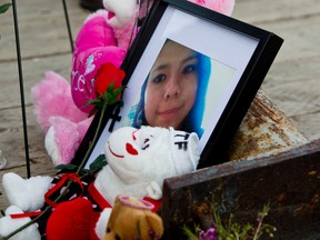 A memorial has been erected at the Alexander Docks in Winnipeg, Man., close to where the 15-year-old missing Tina Fontaine's body was found on Sun., Aug. 17, 2014. (Brook Jones/QMI Agency)