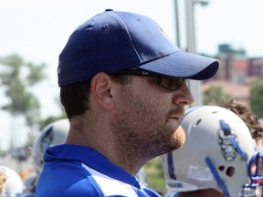 Ben Leeson/The Sudbury Star
Sudbury Gladiators head coach Reg Bonin watches from the sideline during a game against the Huronia Stallions earlier this season. Bonin, who led the Glads to a playoff berth this year, has yet to decide whether he'll return for 2015.