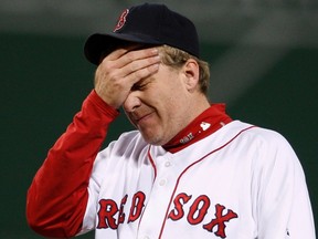 Boston Red Sox pitcher Curt Schilling reacts after giving up a home run to the Cleveland Indians during the ALCS playoffs in Boston, in this October 13, 2007 file photo. (REUTERS)