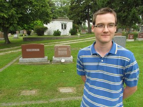 Eric Curragh is shown in this file photo standing in Hillsdale Cemetery where the Petrolia Heritage Committee and its partners are planning a heritage walking tour for Sept. 13. Curragh, a university student hired by the committee last summer, researched stories of former town residents buried at the cemetery for last year's tour, and also helped gather information for this year's event.  PAUL MORDEN/THE OBSERVER/QMI AGENCY