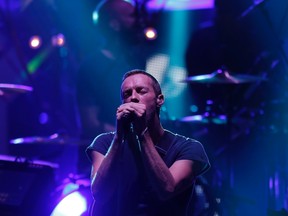 Chris Martin of Coldplay performs at the MTV Video Music Awards Japan 2014 in Chiba, near Tokyo June 14, 2014. (REUTERS/Yuya Shino)