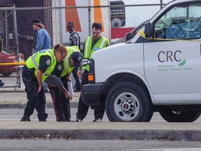 Emergency services at the scene after two pedestrians were struck by a van near Victoria Park Ave. and O'Connor Rd. Wednesday, Aug. 20, 2014. (Victor Biro photo)