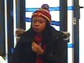 Durham police are looking to identify this woman, a suspected accomplice in bank fraud.