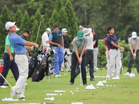The pros took to the driving range on Wednesday at Loyalist Golf and Country Club for the PGA Tour's Great Waterway Classic. (Julia McKay/The Whig-Standard)