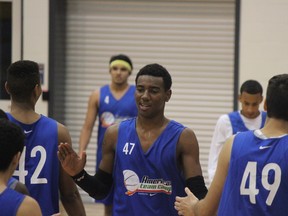Scarborough native Isiaha Mike was named MVP at the Americas Team Camp at Ryerson this week. Raptors’ Bruno Caboclo (right) also make an appearance. (Basketball Canada/photo)