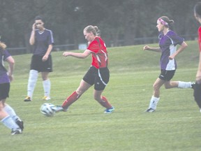 Kim Cowan of the Portage Blaze passes the ball during Portage's loss to the SE Shooters Aug. 20. (Kevin Hirschfield/The Graphic)