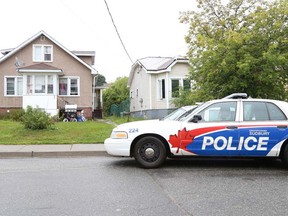 Gino Donato/The Sudbury Star
Two Greater Sudbury Police Services cruisers sit in front of a home on Montague street in the Donovan where two suspects were arrested following a home invasion on Charlotte Street earlier in the day Wednesday.