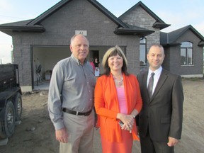 Bluewater Health officials took a first look at this year's Dream Home, at 41 Kamal Dr., set to be the grand prize in this year's fundraising lottery for the hospital foundation. From left, Doug Bain, owner of builder Key Homes, hospital CEO Sue Demony and Dr. Michel Haddad, medical director of the hospital's maternal, infant, child program. (Observer file photo)
