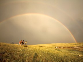 The Elder in the Making documentary crew work under a double rainbow during production while at the Piikani Nation. The film follows two young men attempting to answer questions about their heritage and their futures. Photo submitted.