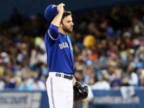 Blue Jays starter Brandon Morrow is expected to be back with the team some time in September. (DAVE ABEL/TORONTO SUN)