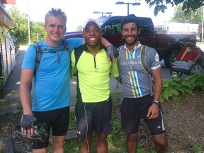 Cyclists Jay Toole, left, Mo Farunia and Gabe Williams in Wallacetown, doing "Something nice for someone. Today and every day."
Contributed