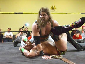 Cody Deaner, a.ka. Chris Gray, pins his opponent. Deaner, who was born and raised in Port Bruce, will be wrestling in Parkhill Sept. 18, 2014. He wrestles frequently in St. Thomas. Supplied Photo