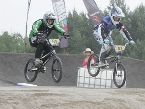 Local riders from the Stony Plain BMX Club had good showings in the two-day Provincial Series races held at their home track on Aug. 16 and 17. Bailey Sproxton (N5) who looks to overtake a rider in her age group down one of the straightaways. - Gord Montgomery, Reporter/Examiner