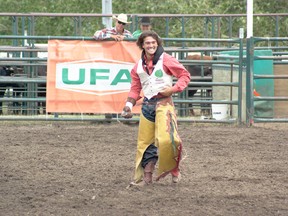 Caleb Bennett was all smiles after his winning ride in the bareback event at the Pincher Creek Pro Rodeo. Greg Cowan photos/QMI Agency.