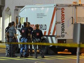 Gunmen wearing Halloween masks stole $431,000 from an armoured Garda truck in Montreal on Thursday evening. (PASCAL GIRARD/QMI Agency)