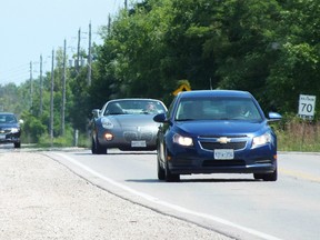 Traffic flows down Lakeshore Road near Mike Weir Park Friday. A Bright's Grove resident is concerned the growth of the community has led to noise pollution along the main artery into town. BRENT BOLES/THE OBSERVER/QMI AGENCY
